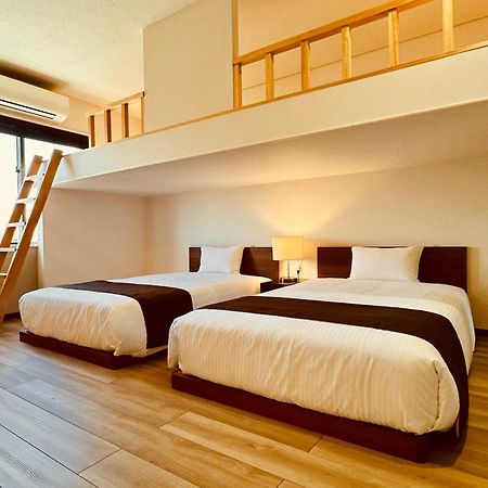 Phoenix Park Hotel Nago Buitenkant foto
