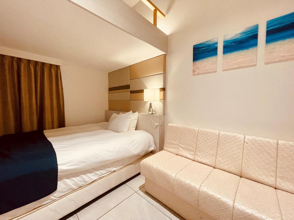 Phoenix Park Hotel Nago Buitenkant foto