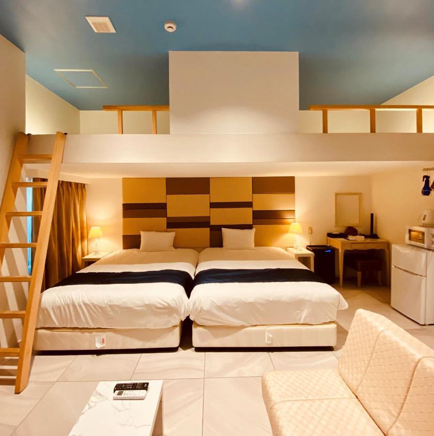 Phoenix Park Hotel Nago Buitenkant foto