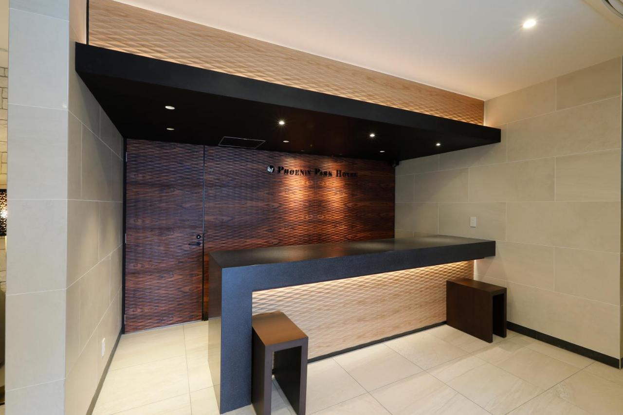 Phoenix Park Hotel Nago Buitenkant foto