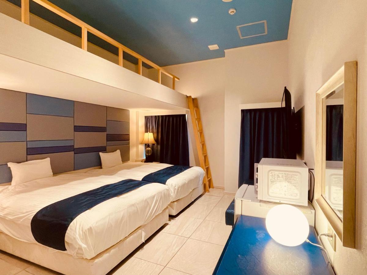 Phoenix Park Hotel Nago Buitenkant foto