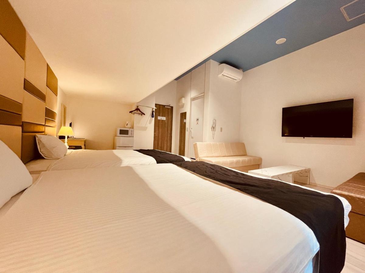 Phoenix Park Hotel Nago Buitenkant foto