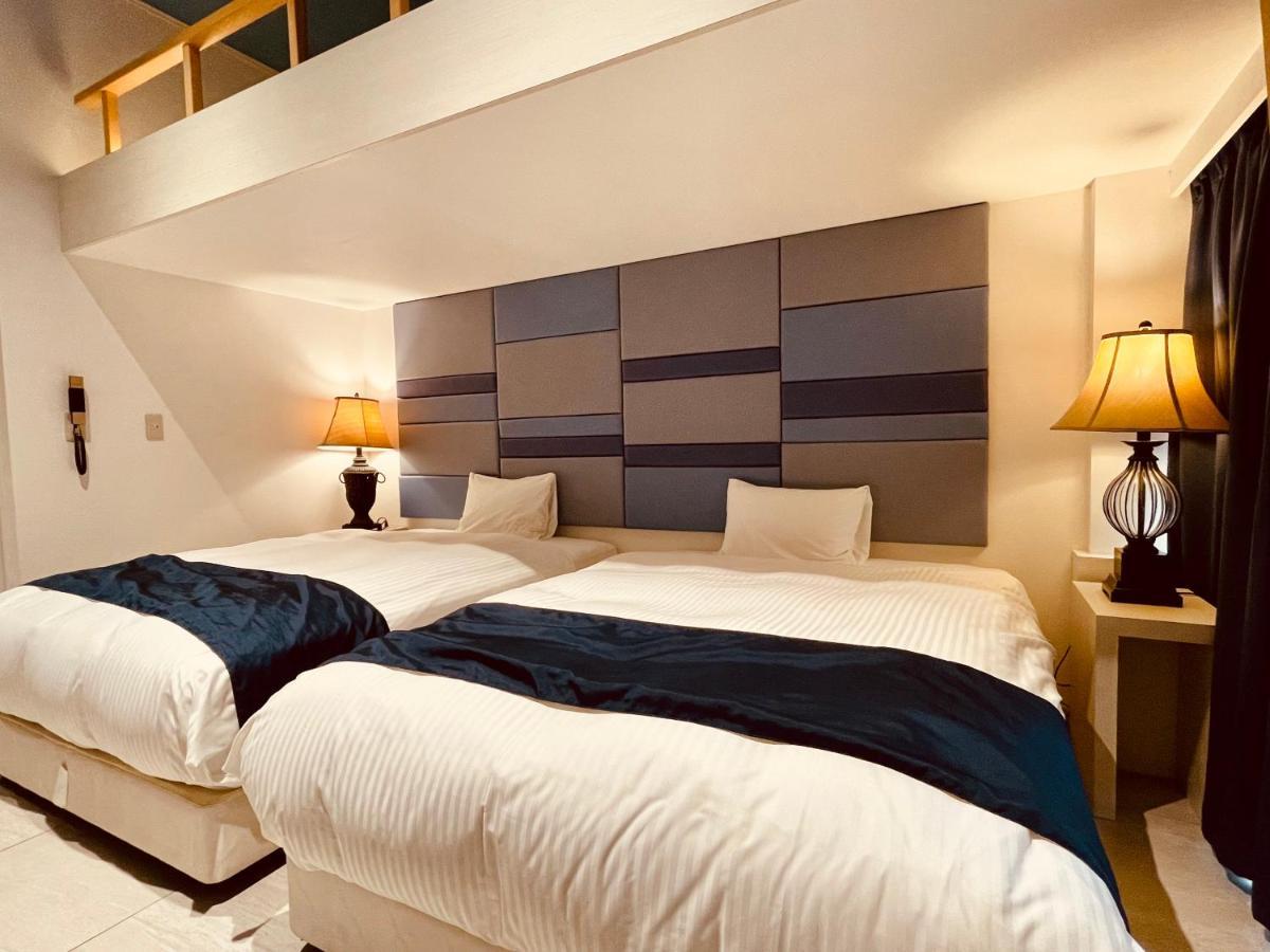 Phoenix Park Hotel Nago Buitenkant foto