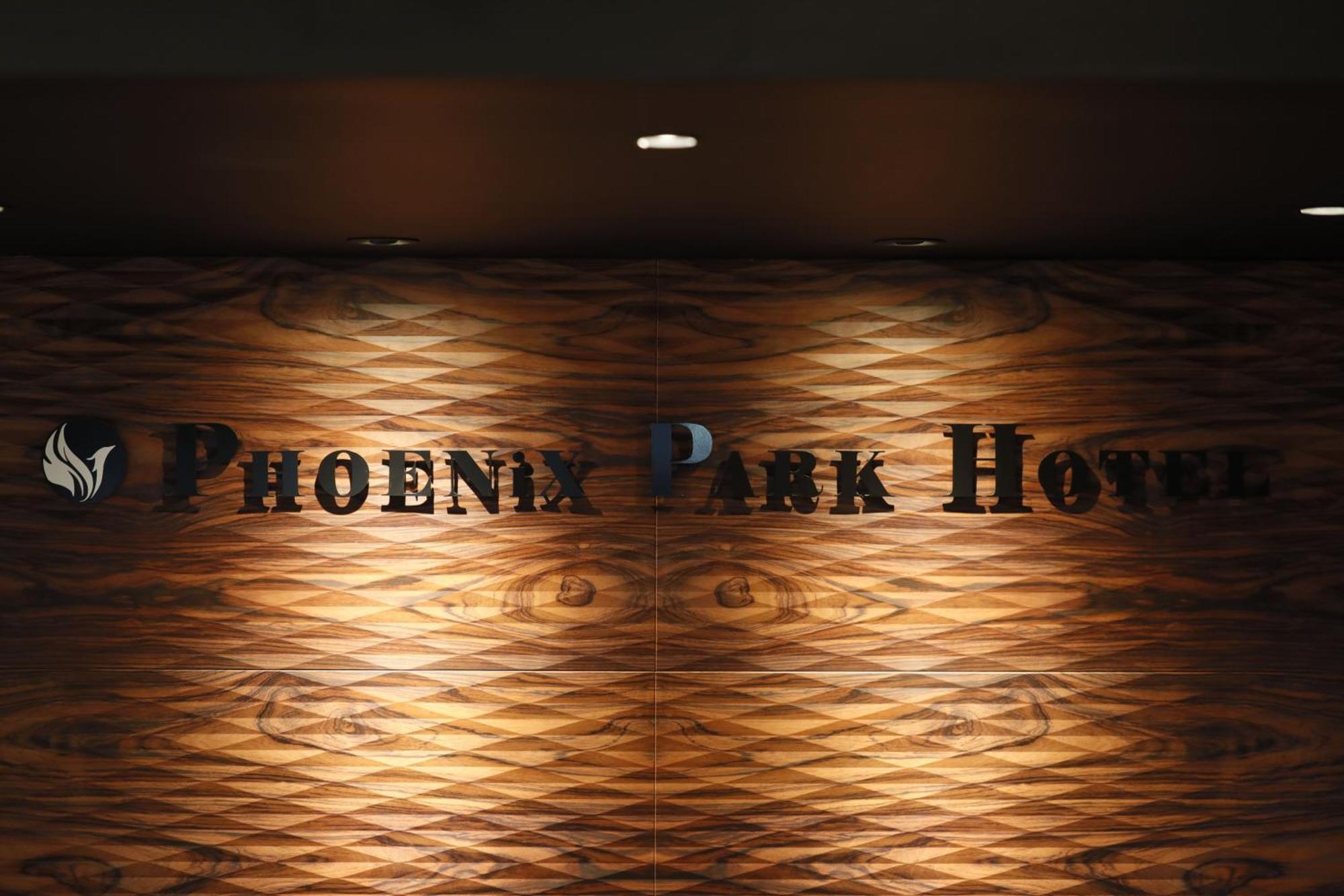 Phoenix Park Hotel Nago Buitenkant foto