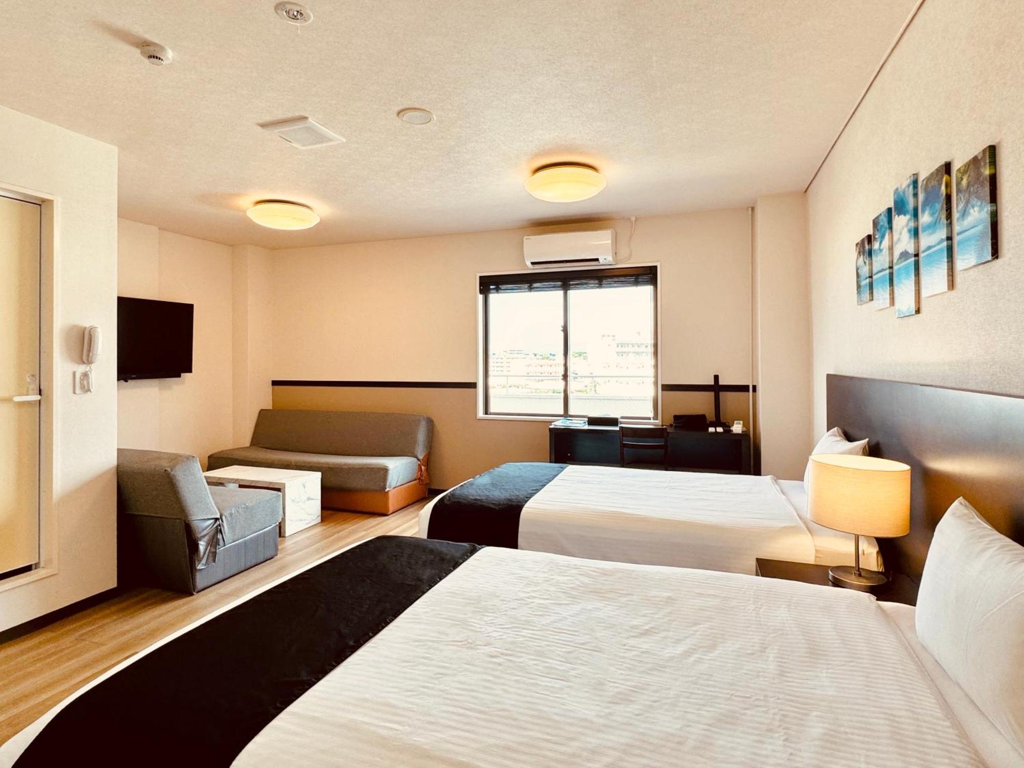 Phoenix Park Hotel Nago Buitenkant foto
